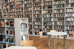 Professor's academic book collection with shelves of specialized books