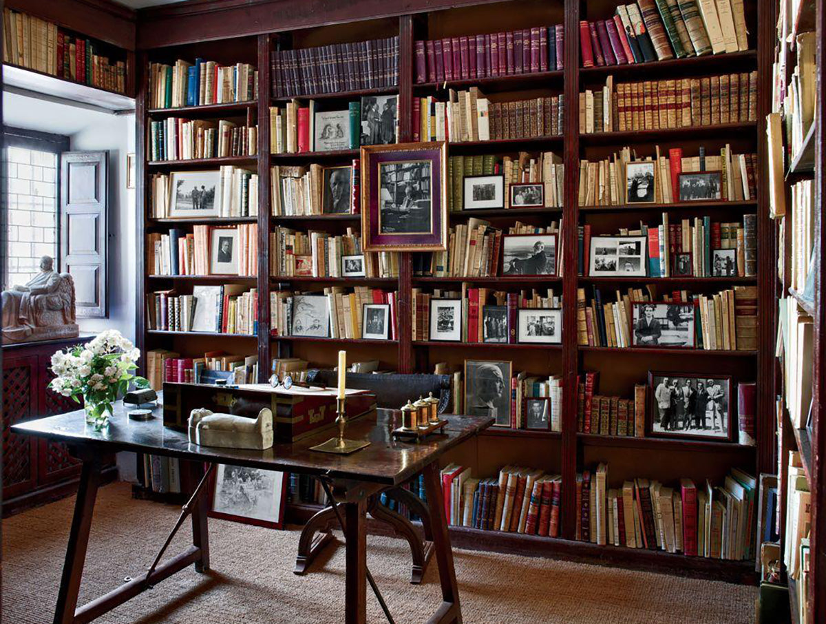 Inherited family library with shelves of books collected over generations